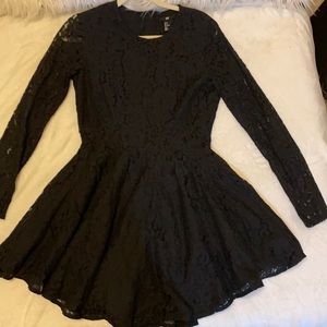 a black short lace dress from H&M. Size 8.